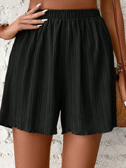 Jednokolorowe spodenki plażowe z gumką w pasie