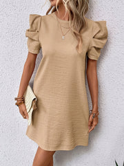 Sukienka typu tunika w jednolitym kolorze z bufiastymi rękawami