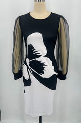 Wąska sukienka z długimi rękawami i siatkowym nadrukiem