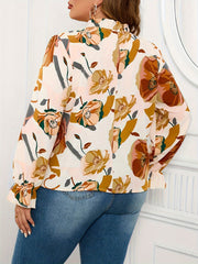 Elegancki, wygodny top w kwiaty z długim rękawem i dzwonkowatymi rękawami