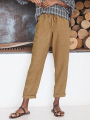 Luźne spodnie z bawełny i lnu, ściągane sznurkiem