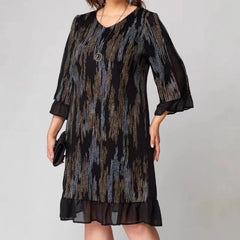 Sukienka w pionowe paski