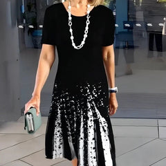 Sukienka plisowana z nadrukiem