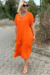 Solidna lniana sukienka maxi z dekoltem w serek i haftowanym dołem