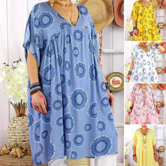 Letnia, prosta spódnica midi z nadrukiem i szerokim dołem