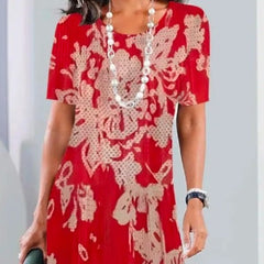 Sukienka plisowana z nadrukiem