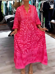 Damska luźna sukienka z dekoltem w serek i nadrukiem