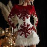 Sukienka z długim rękawem i nadrukiem w świąteczne płatki śniegu