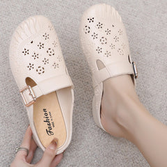 🔥Ostatni dzień 50% zniżki – Damskie sandały na niskim obcasie z okrągłą główką i rzeźbionymi kwiatami