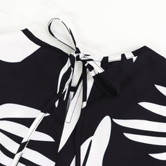 Damska sukienka bez rękawów ze ściągaczem i nieregularnym nadrukiem