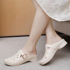 🔥Ostatni dzień 50% zniżki – Damskie sandały na niskim obcasie z okrągłą główką i rzeźbionymi kwiatami