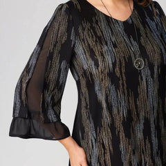 Sukienka w pionowe paski