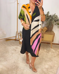 Damska luźna sukienka z krótkim rękawem i nadrukiem