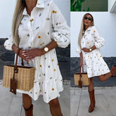 Biała sukienka koszulowa z motywem kwiatowym w stokrotki