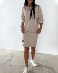 Obcisła sukienka damska z długim rękawem