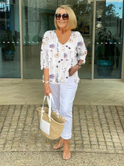Elegancka koszula z kwiatowym wzorem i guzikami