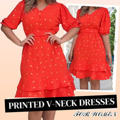 Sukienki damskie z nadrukiem w serek, krótkim rękawem i guzikami w talii