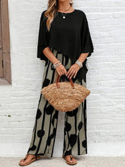 Modny damski asymetryczny top z eleganckim zestawem spodni z nadrukiem