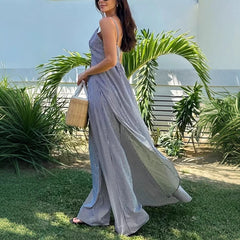 Zestaw: bezrękawnik w paski, długi, swobodny top i luźne, proste spodnie