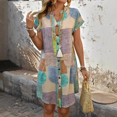 Sukienka damska z nadrukiem guzików i dekoltem w serek