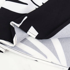 Damska sukienka bez rękawów ze ściągaczem i nieregularnym nadrukiem