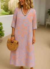 Damska sukienka z krótkim rękawem i nadrukiem, casualowa i długa