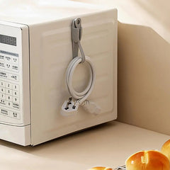 🎄Montaż naścienny, samoprzylepny, zdejmowany organizer z uchwytem na przewód