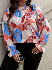 Elegancki, wygodny top w kwiaty z długim rękawem i dzwonkowatymi rękawami