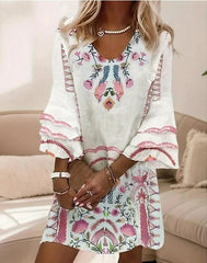 Sukienka z dekoltem w serek i rękawami typu trąbka w świeżym print