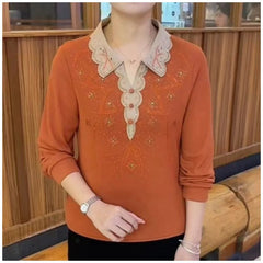 Temperamentny damski top z klapami ze strasu