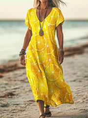 Sukienka damska z luźnym nadrukiem i długim dekoltem w serek