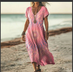 Sukienka damska z luźnym nadrukiem i długim dekoltem w serek