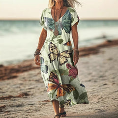 Sukienka damska z luźnym nadrukiem i długim dekoltem w serek