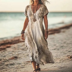 Sukienka damska z luźnym nadrukiem i długim dekoltem w serek