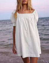 Damska letnia sukienka mini o linii A z kieszeniami