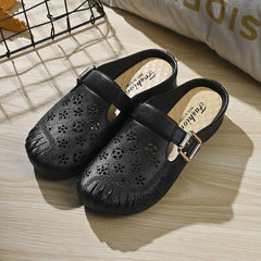 🔥Ostatni dzień 50% zniżki – Damskie sandały na niskim obcasie z okrągłą główką i rzeźbionymi kwiatami