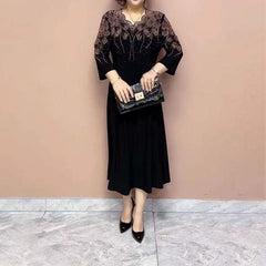 Damska szlachetna elegancka sukienka z brokatowym dekoltem