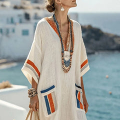 Elegancka długa sukienka z kieszeniami