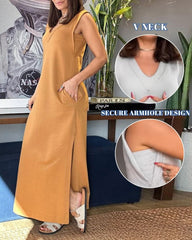 Sukienka swobodna z dekoltem w serek i rozcięciem na dole oraz bezpiecznym wycięciem na ręce