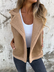 Jednoczęściowa kamizelka ze sztucznego futra z klapami i kieszeniami