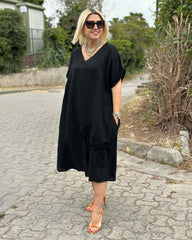 Solidna lniana sukienka maxi z dekoltem w serek i haftowanym dołem