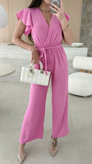 Letni dopasowany kombinezon z szerokimi nogawkami i dekoltem w serek