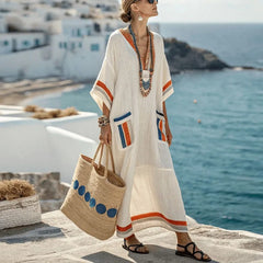 Elegancka długa sukienka z kieszeniami