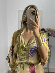 Damska bluzka z szerokimi nogawkami i spódnicą maxi z elastyczną talią