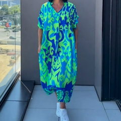 Damska, elegancka elegancka sukienka w dekolcie