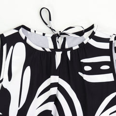 Damska sukienka bez rękawów ze ściągaczem i nieregularnym nadrukiem