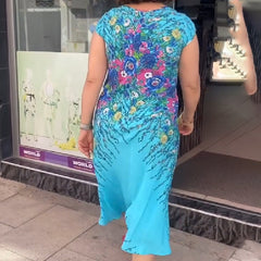 🌸Damska sukienka z nadrukiem i dekoltem w szpic