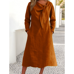 Jednolita sukienka z długimi rękawami i okrągłym dekoltem