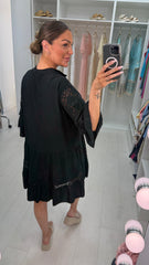 Sukienka koronkowa zakrywająca ciało