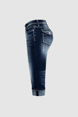 Jeansy Capri ze średnim stanem i kieszeniami, z rolowanym dołem